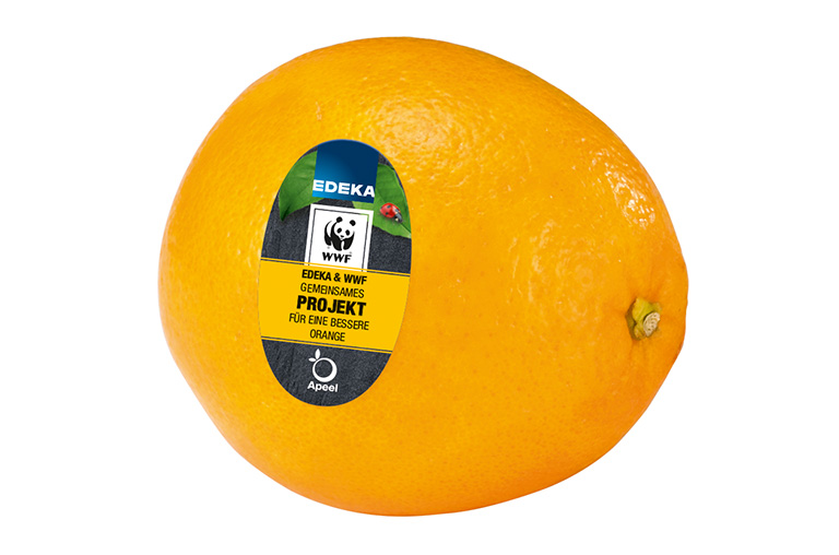 eine Orange mit dem pflanzlichen "Frischesafe" von Apeel